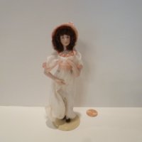 Lady Doll wearing white outfit w/pink hat